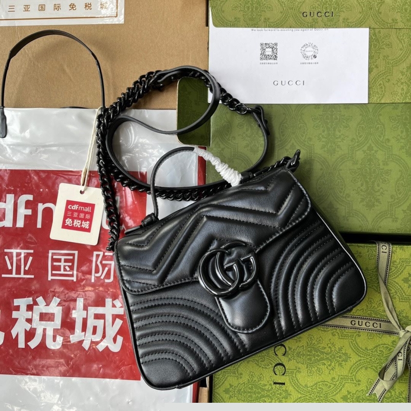 G*u*i top handle bags